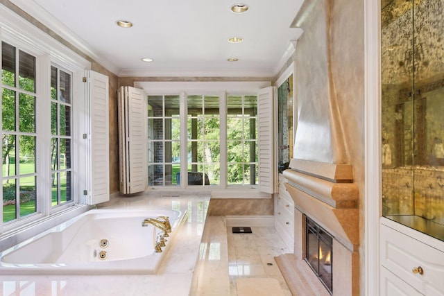 17950 Breezy Point Rd, Woodland, MN 55391 - full bath with plenty of natural light, a tub with jets, a fireplace, ornamental molding, and recessed lighting