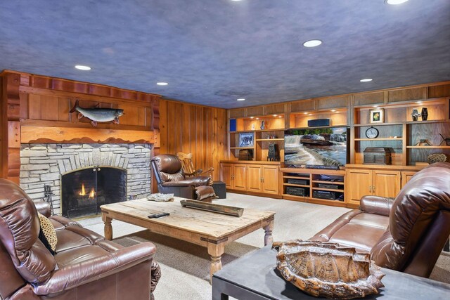 17950 Breezy Point Rd, Woodland, MN 55391 - living area featuring carpet, recessed lighting, wood walls, and a fireplace