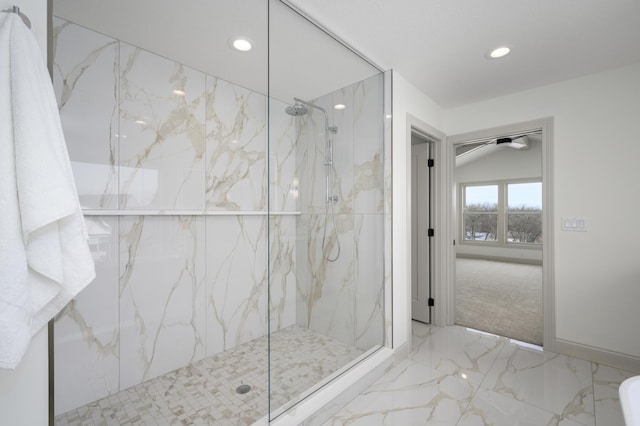 bathroom featuring a tile shower