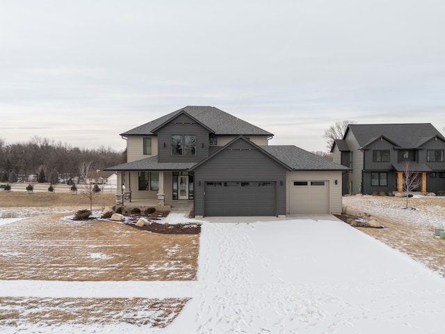 view of front facade featuring a garage and covered porch