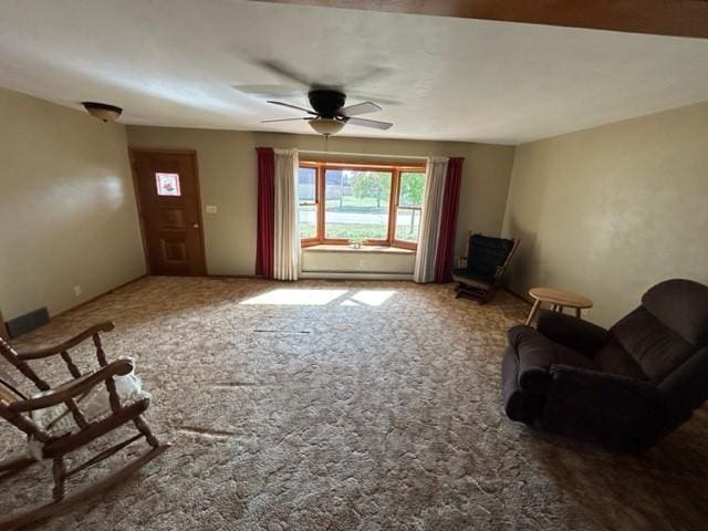 306 9th St, Westbrook, MN 56183 - carpeted living room with ceiling fan