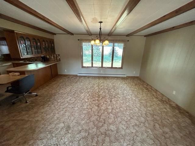 306 9th St, Westbrook, MN 56183 - unfurnished dining area featuring beam ceiling, a chandelier, carpet floors, and a baseboard radiator