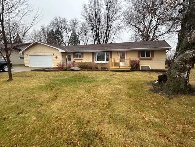 306 9th St, Westbrook, MN 56183 - single story home with an attached garage, concrete driveway, and a front yard