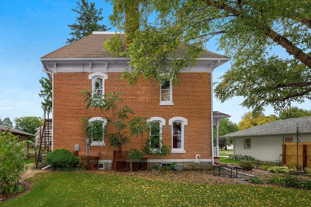 exterior space with a front lawn