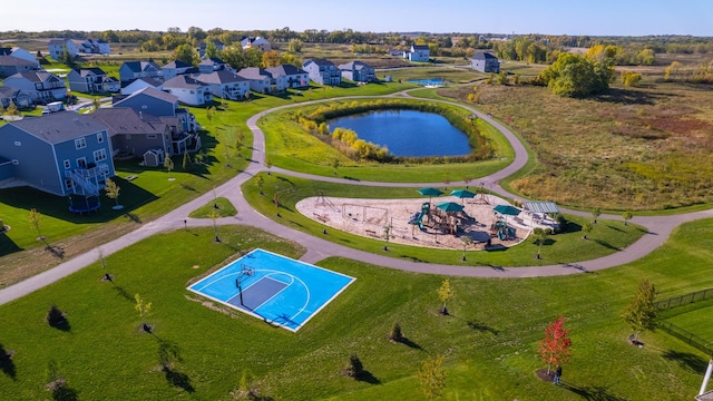 aerial view with a water view and a residential view