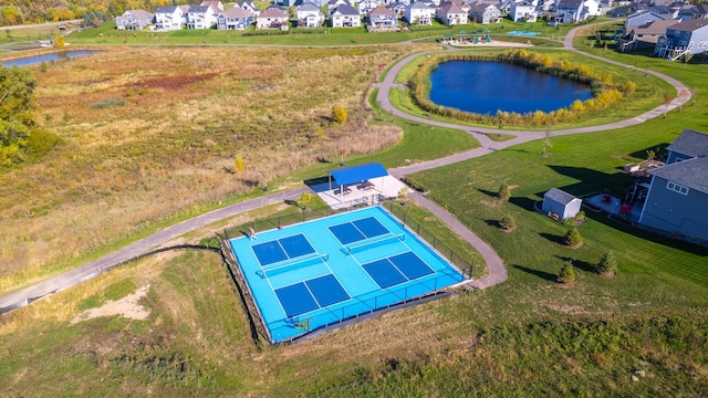 bird's eye view featuring a residential view and a water view