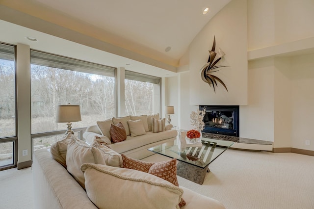 living room with carpet and lofted ceiling