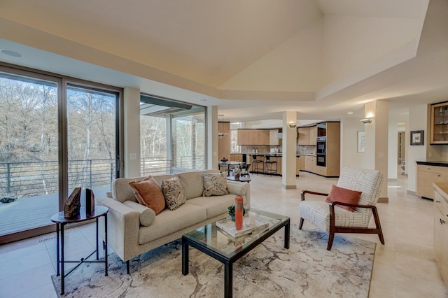 tiled living room featuring lofted ceiling