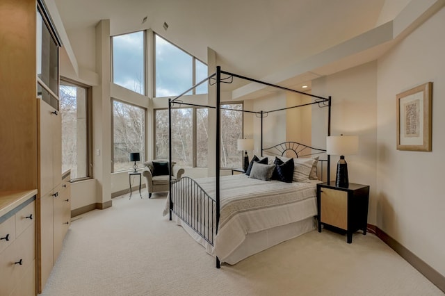 1 Capaul Woods Ct, North Oaks, MN 55127 - bedroom featuring light carpet and baseboards