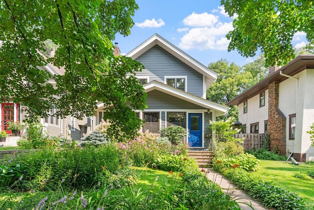 view of front of home with a front lawn