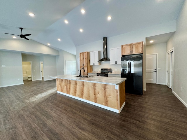 kitchen featuring black appliances, dark wood-type flooring, wall chimney range hood, an island with sink, and ceiling fan