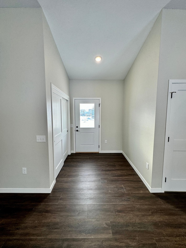 foyer entrance with dark hardwood / wood-style flooring