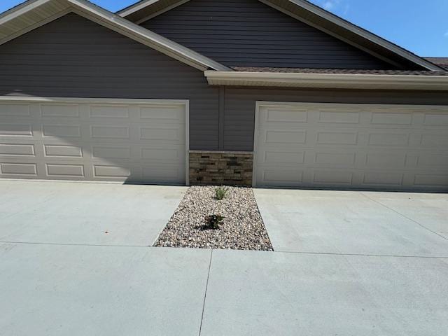 2214 Red Bird Ln, Fairmont, MN 56031 - view of front of house featuring driveway and a garage