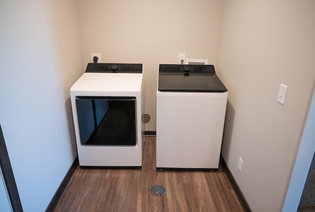 2214 Red Bird Ln, Fairmont, MN 56031 - laundry area with separate washer and dryer and wood finished floors