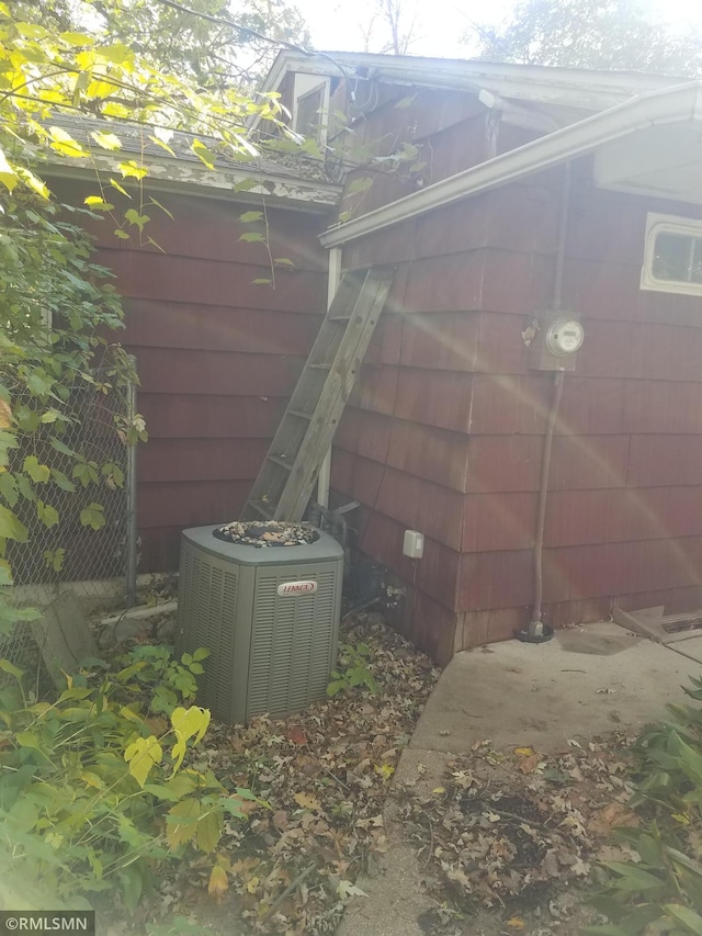 view of home's exterior with central AC unit