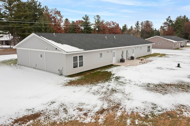 view of snow covered house