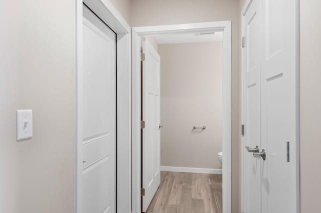 hallway featuring light hardwood / wood-style floors