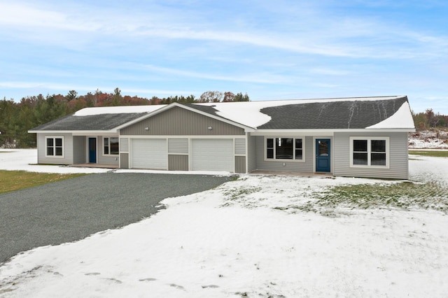 single story home with a garage