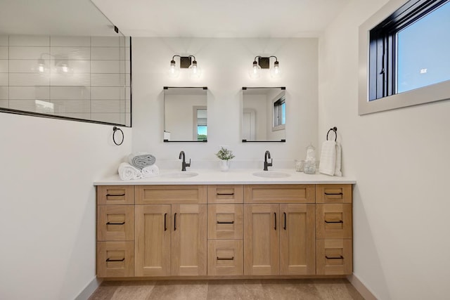 bathroom with double vanity