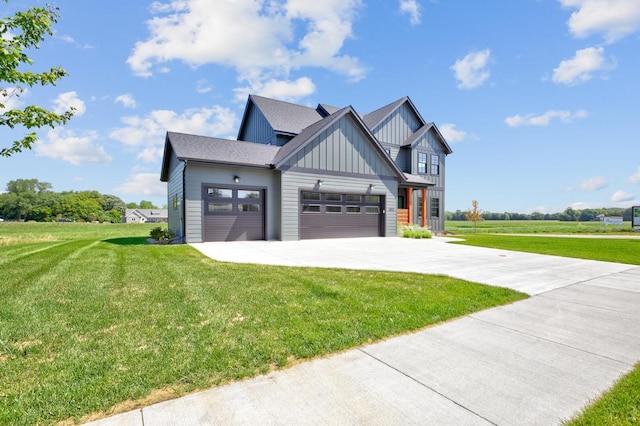 modern inspired farmhouse featuring a front lawn and a garage