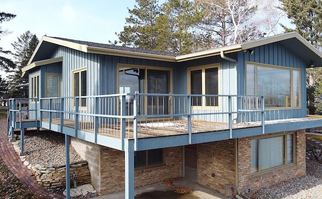 17850 Cedar Park Loop, Fergus Falls, MN 56537 - rear view of property featuring board and batten siding and a deck