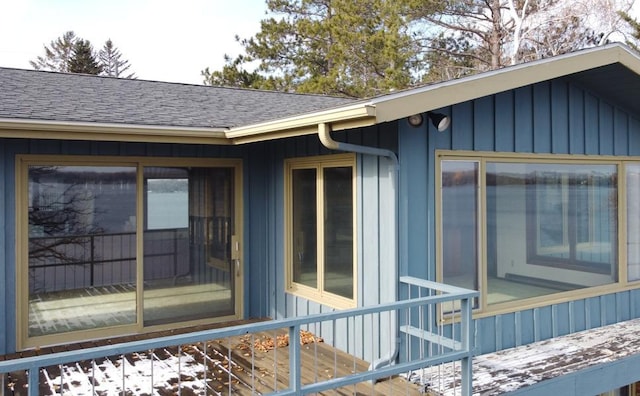 17850 Cedar Park Loop, Fergus Falls, MN 56537 - view of side of home with roof with shingles and board and batten siding