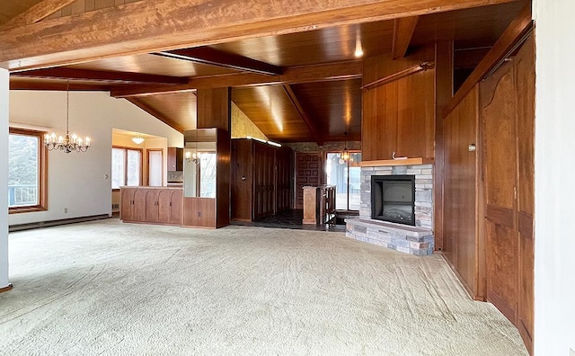 unfurnished living room featuring light colored carpet, an inviting chandelier, a fireplace, wood ceiling, and lofted ceiling with beams