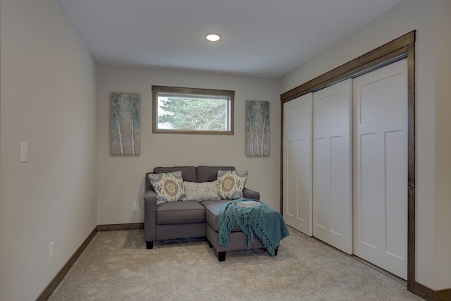 sitting room with light colored carpet