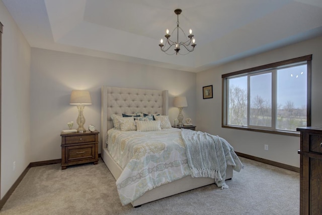 bedroom with light carpet and a notable chandelier