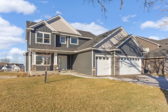 craftsman house featuring covered porch, a front lawn, and a garage