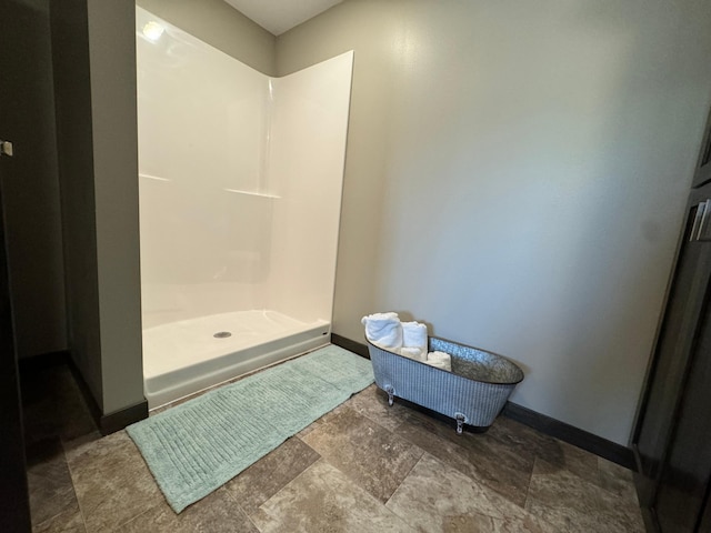 bathroom featuring walk in shower