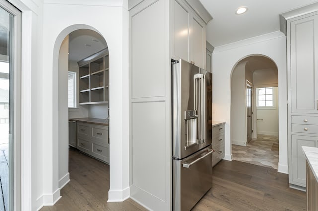 kitchen featuring dark wood-style floors, high quality fridge, and gray cabinets