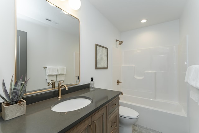 bathroom featuring visible vents, bathing tub / shower combination, toilet, vanity, and recessed lighting