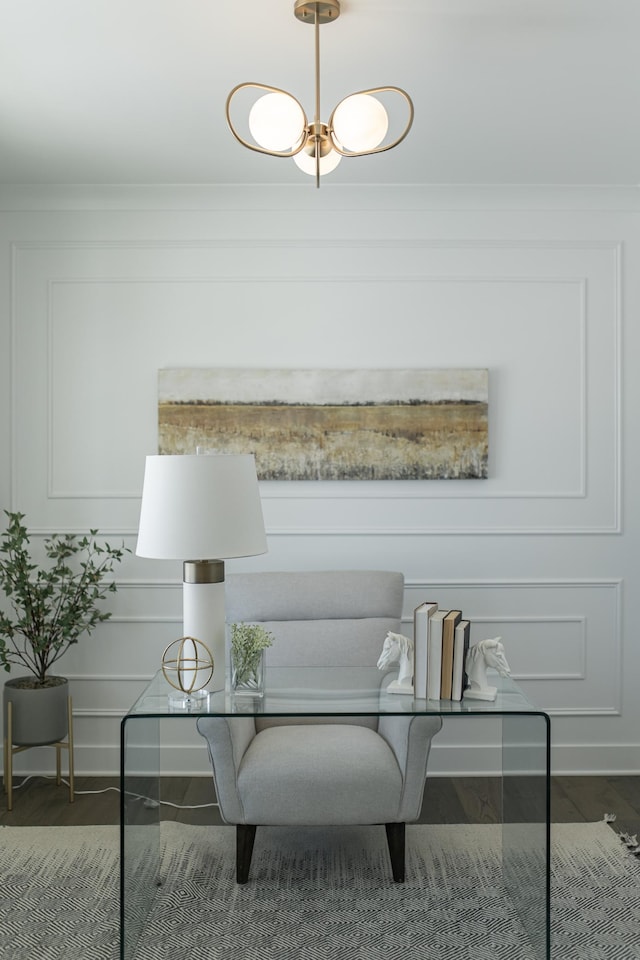 interior space featuring wood finished floors and baseboards