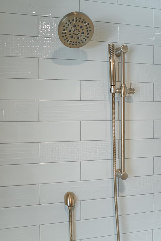 room details with a tile shower