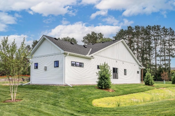 view of home's exterior with a yard