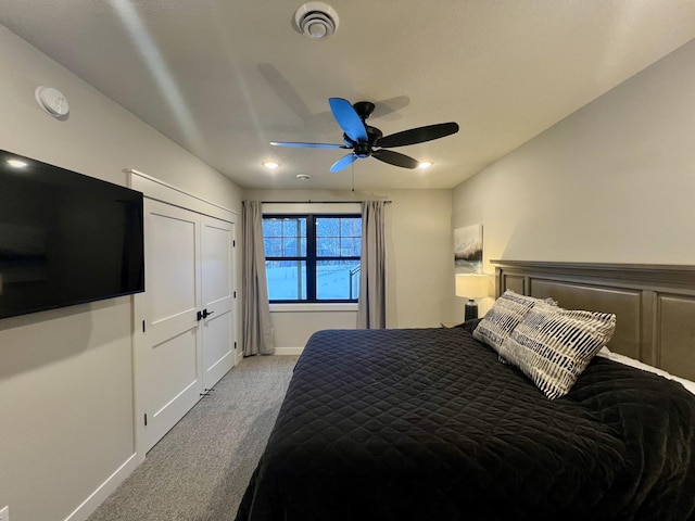 bedroom featuring ceiling fan and carpet flooring