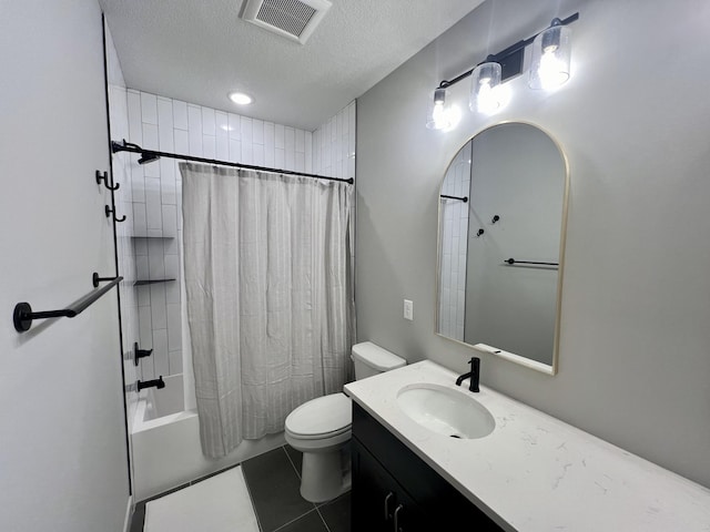 full bathroom featuring tile flooring, shower / bath combination with curtain, a textured ceiling, toilet, and oversized vanity