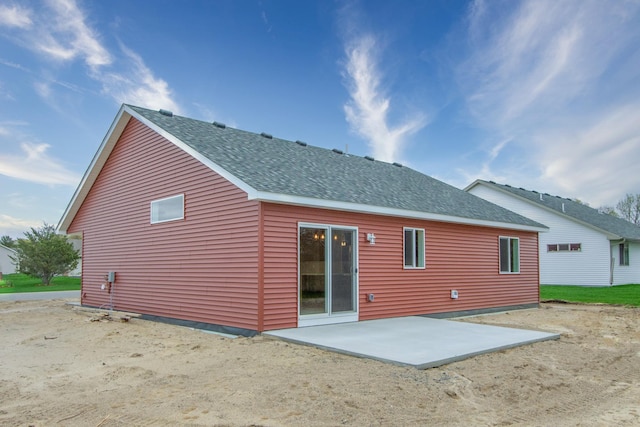 back of house with a patio area