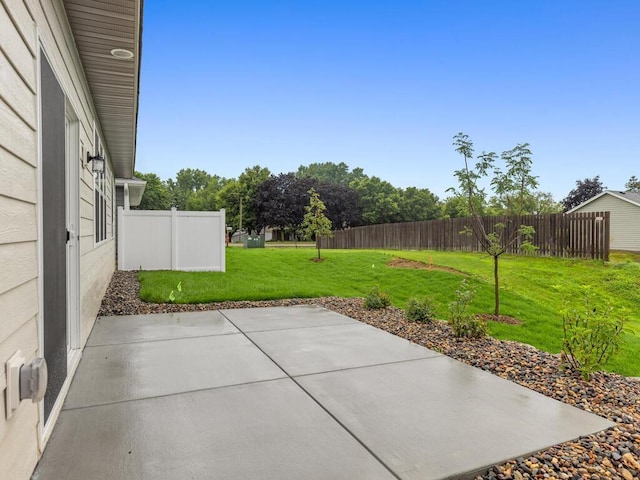 view of patio featuring fence