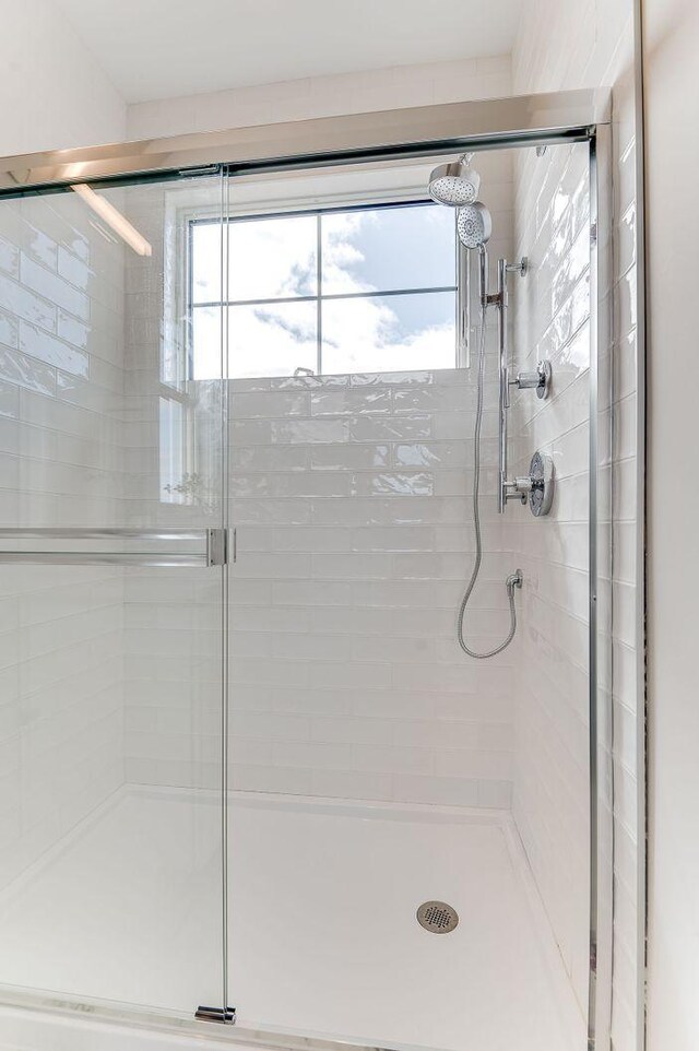 bathroom with an enclosed shower