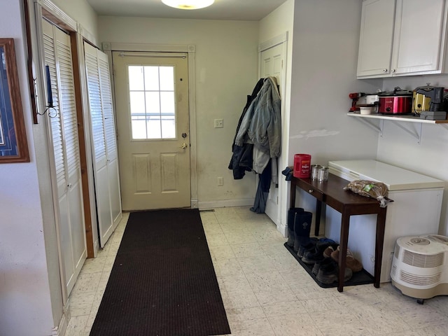 25427 260th St, Callaway, MN 56521 - doorway to outside featuring baseboards and light floors