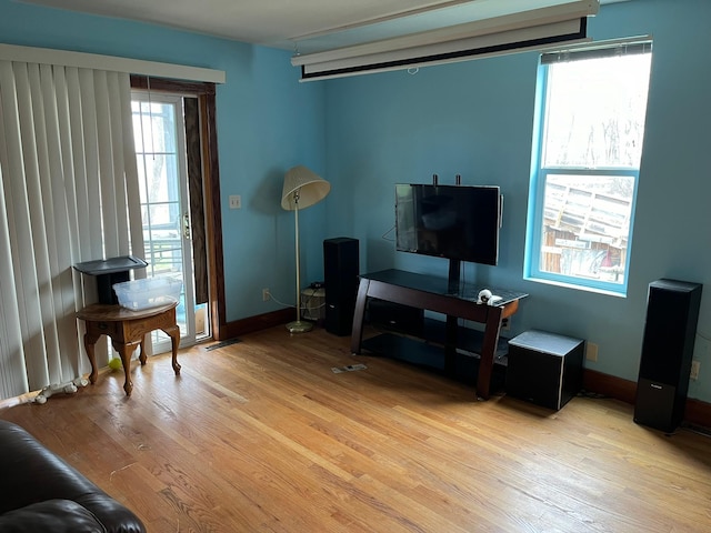 25427 260th St, Callaway, MN 56521 - living room with visible vents, baseboards, and light wood-type flooring