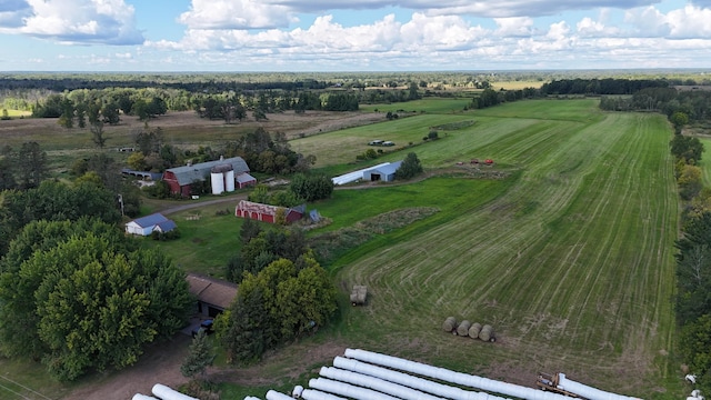 birds eye view of property featuring a rural view