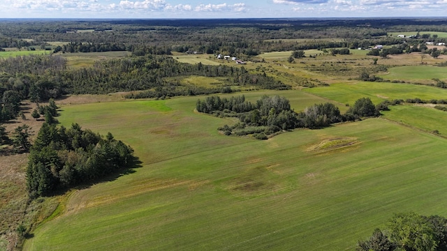 birds eye view of property featuring a rural view