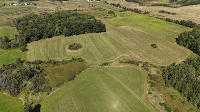 birds eye view of property featuring a rural view