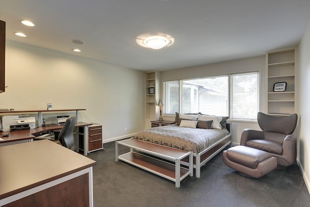 bedroom with dark carpet