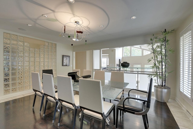 dining room with wood-type flooring