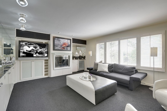 carpeted living room with wine cooler