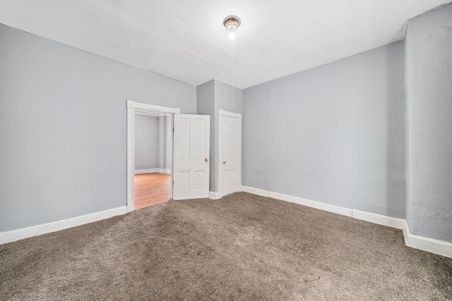 unfurnished bedroom featuring carpet flooring